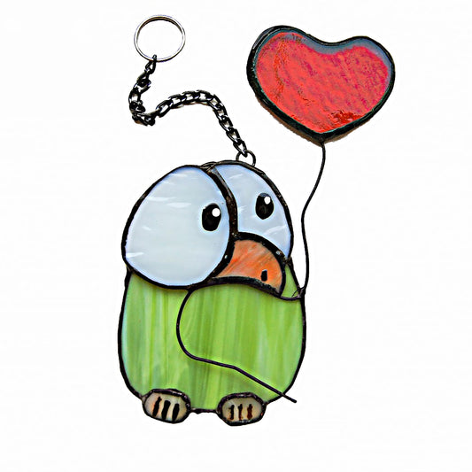 Chick stained glass with heart balloon