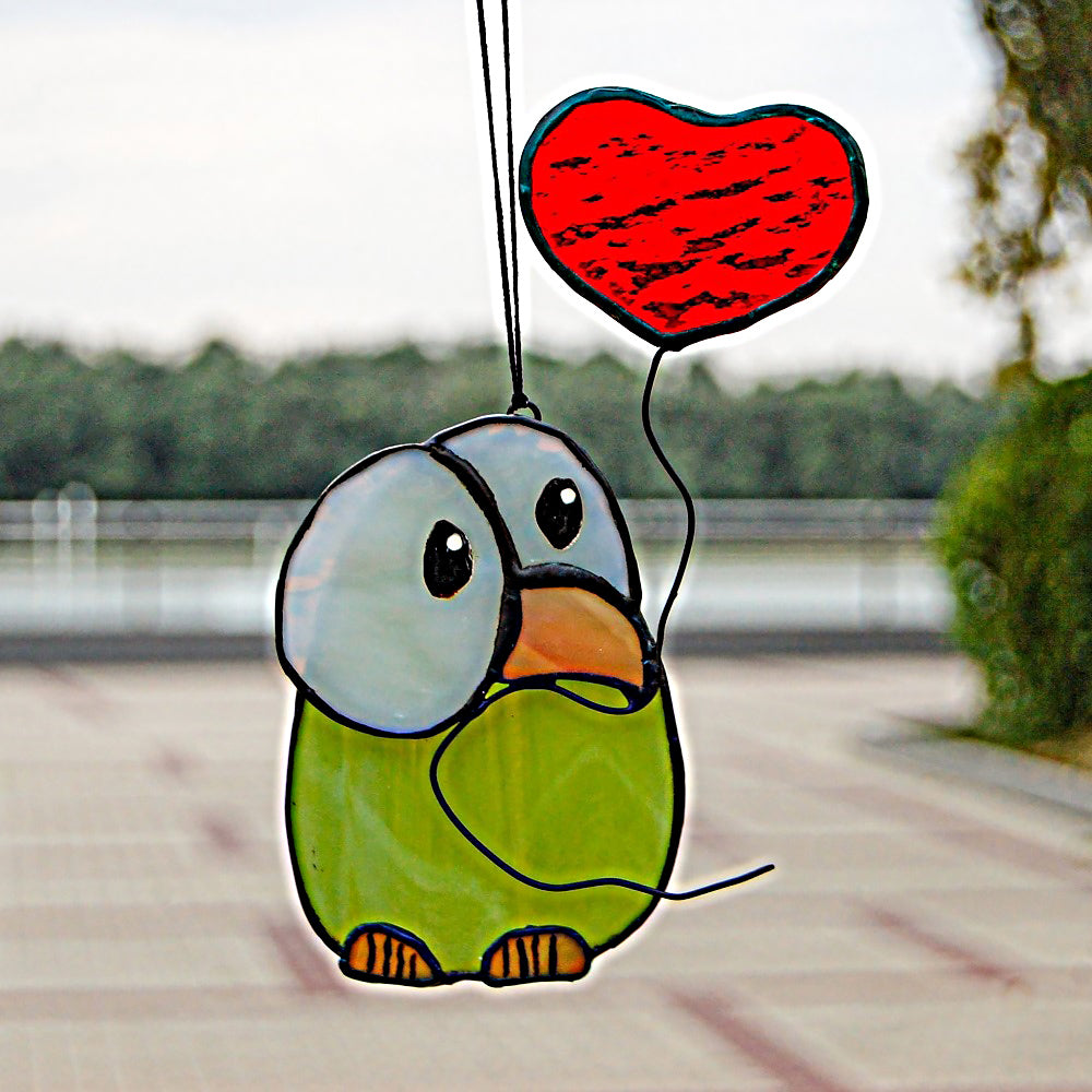 Chick stained glass with heart balloon