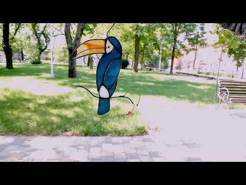 video stained glass toucan